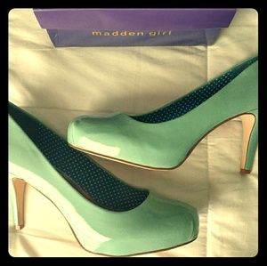 Mint patent leather pumps